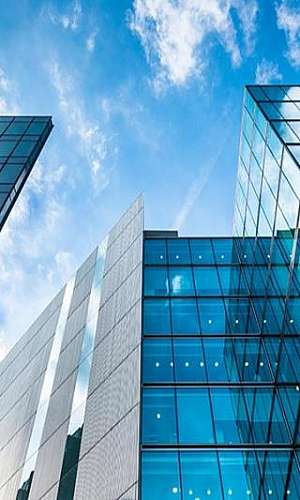 Fachada de prédio com pele de vidro Fachada de prédio com pele de vidro